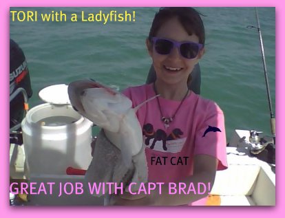 TORI WITH A LADYFISH.